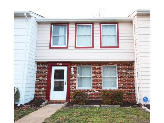 Off White siding and brick with a freshly painted 
