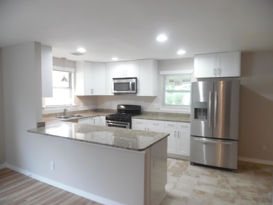 6744 Snow White Dr, Jacksonville, FL 32210 - photo 1