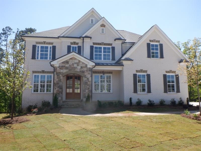 This custom Hammond Plan by Waterford Homes is rea