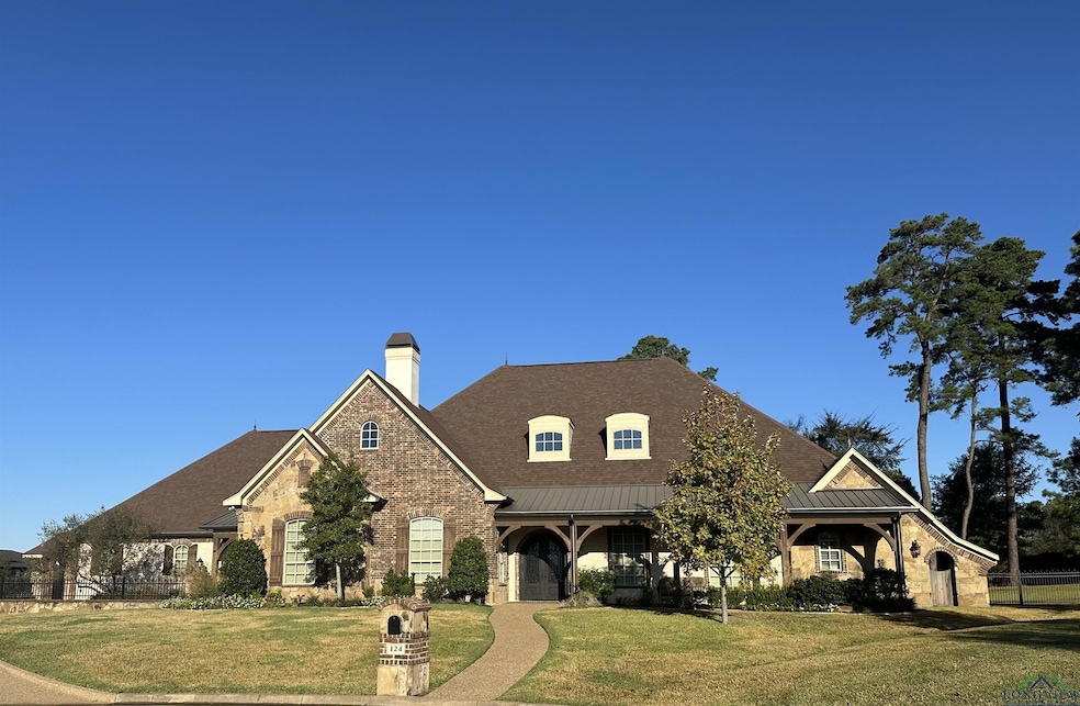 View of front of house with a front lawn