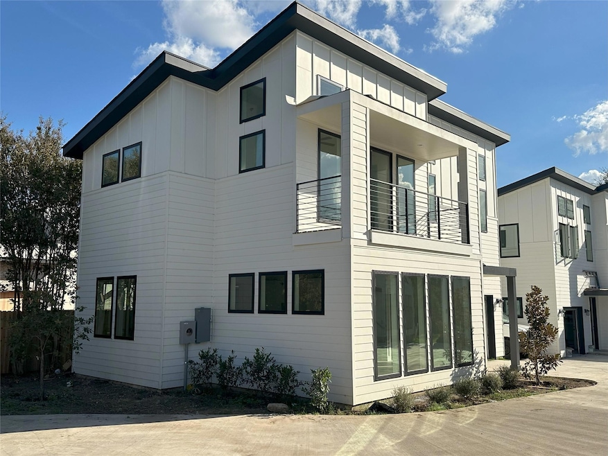 View of side of property featuring board and batt