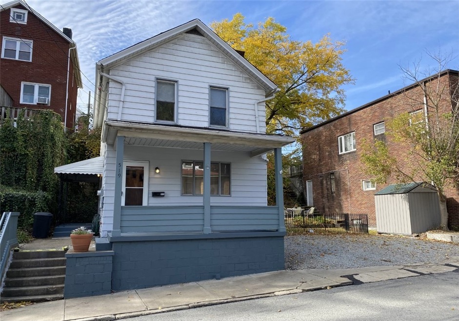 Front view of house & additional lot