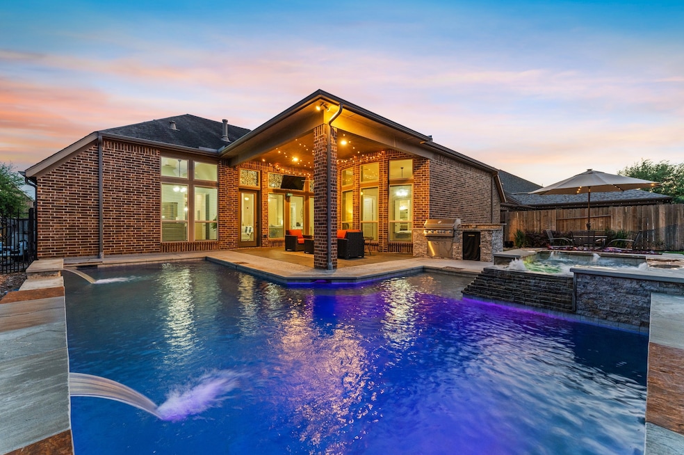 This backyard is an entertainer’s paradise, featur