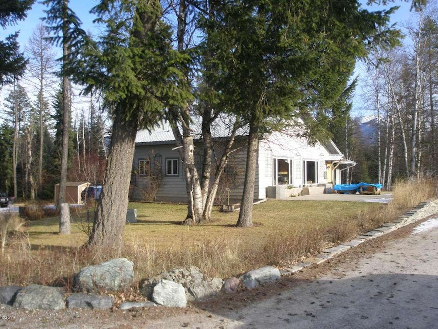 31566 S Ferndale Dr, Bigfork, MT 59911 - photo 1