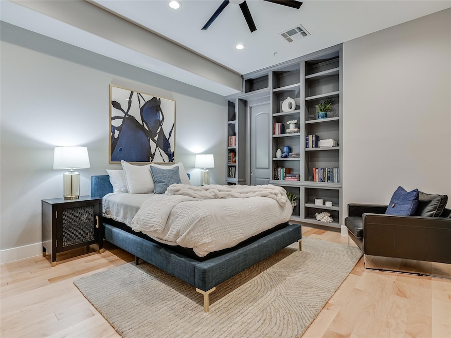 Bedroom featuring visible vents, baseboards, ceil
