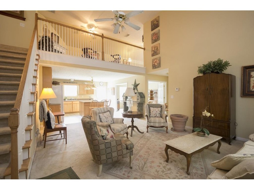 Foyer with vaulted ceilings.  Open floor plan