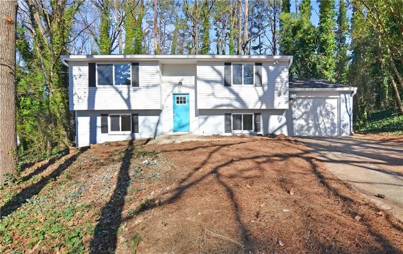 1276 Sandpiper Ln SW, Lilburn, GA 30047 - photo 1