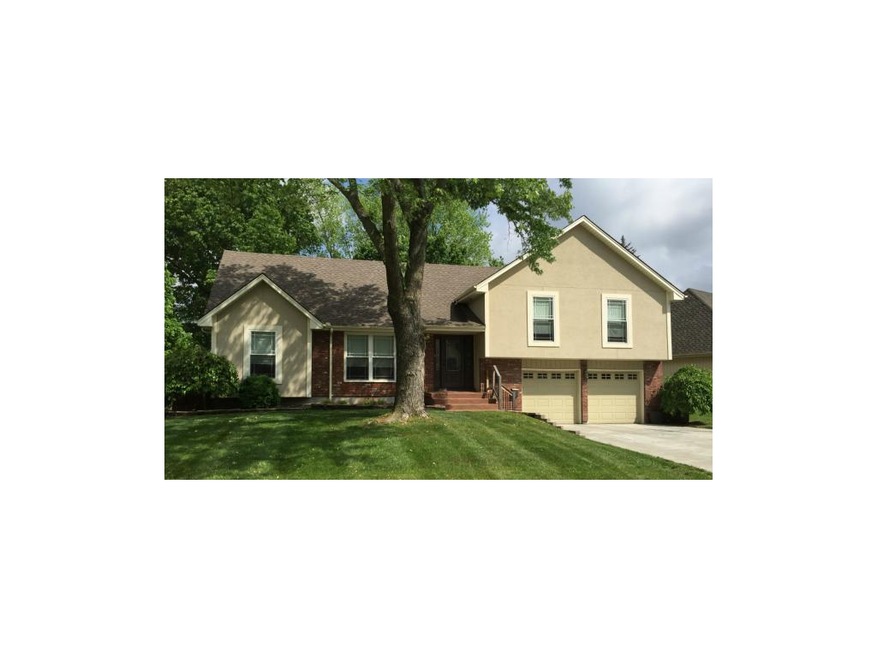 The stucco exterior with vinyl windows, and vinyl 