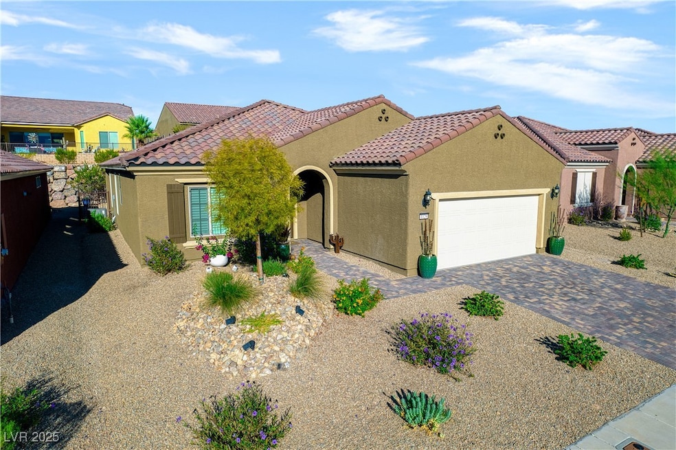 Front of house with low maint landscape