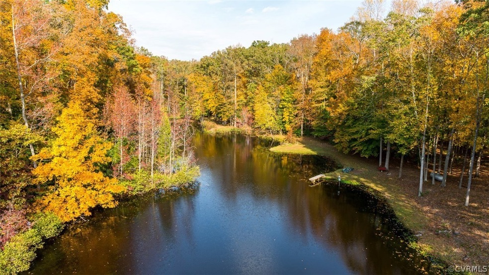 Lot is located between the paved road and 200' of