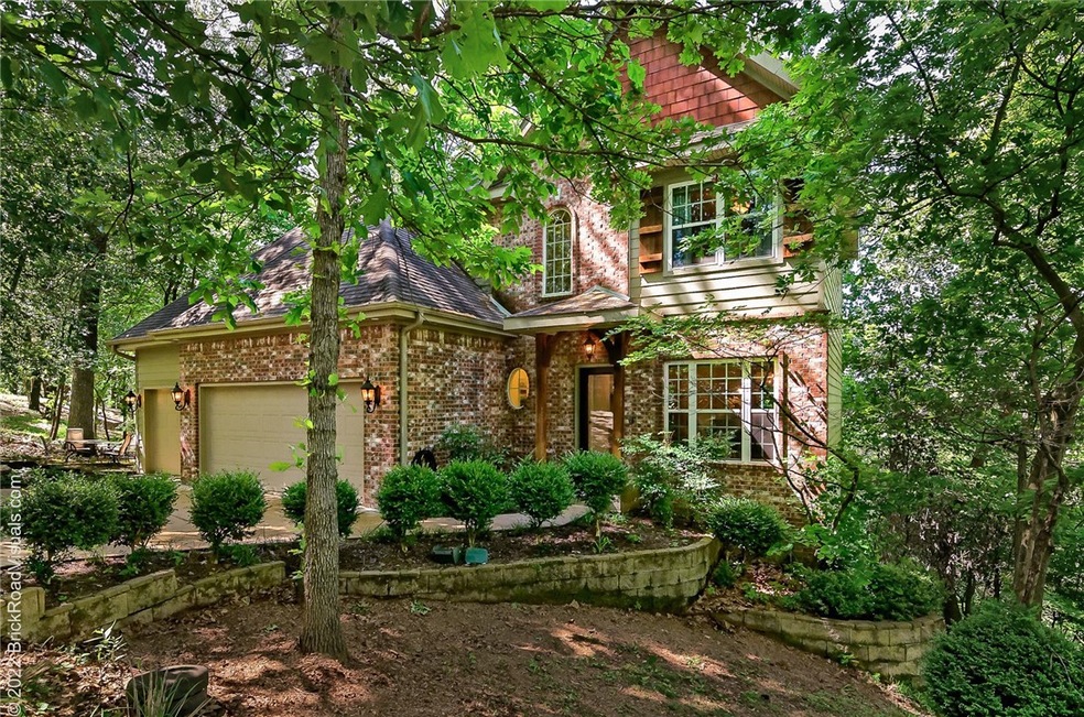 Gorgeous brick home nestled in the trees on Beaver