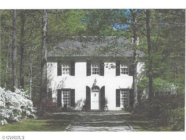 Exterior Front - Springtime with 100 Plus Azaleas 