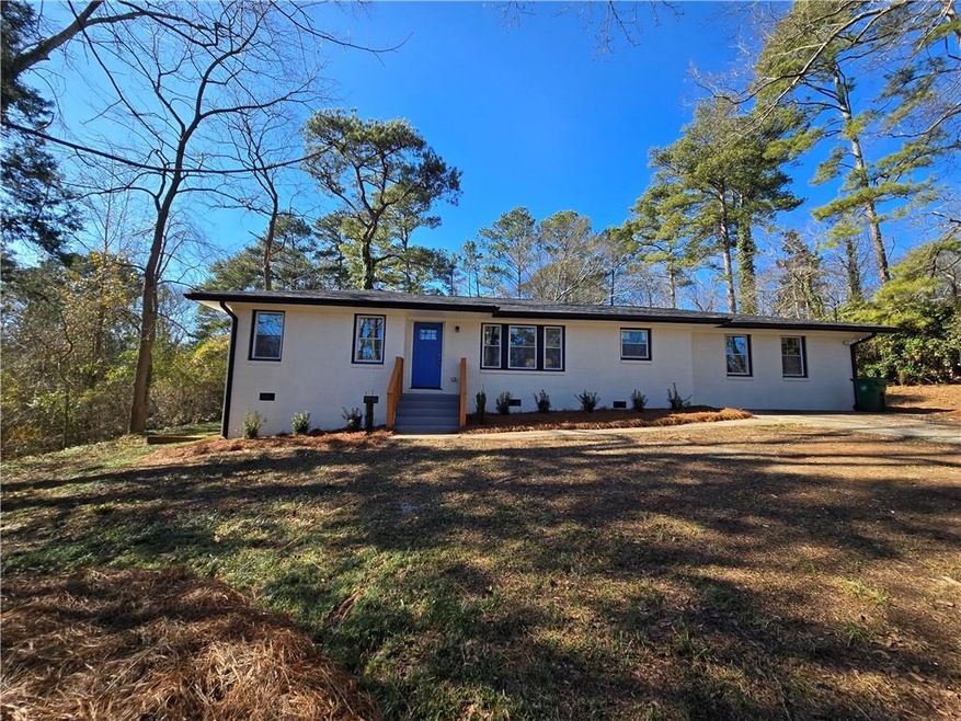 View of front of property with a front yard