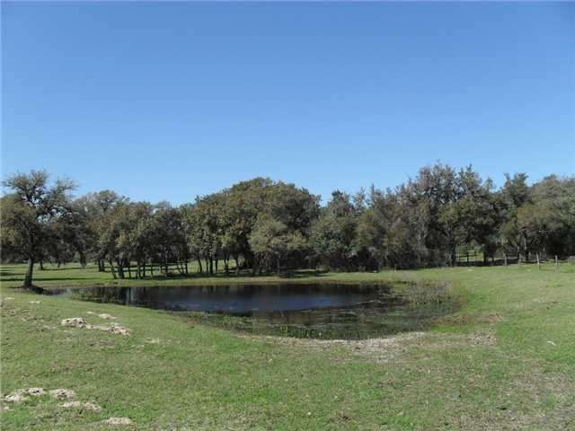 Land : Pond located near near the front of the pro
