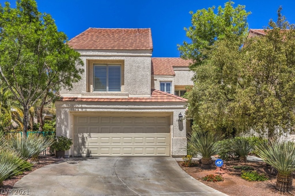 This pristine townhome is located at the end of a