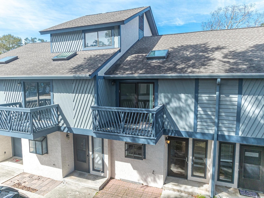 Exterior space featuring a balcony