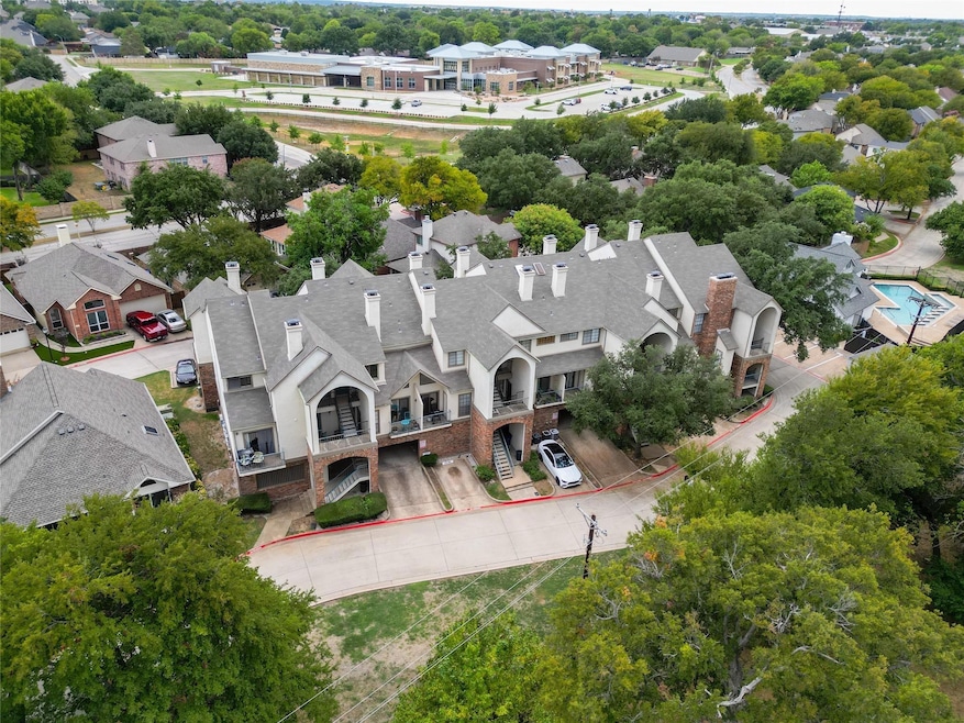 Birds eye view of property from front with tons of