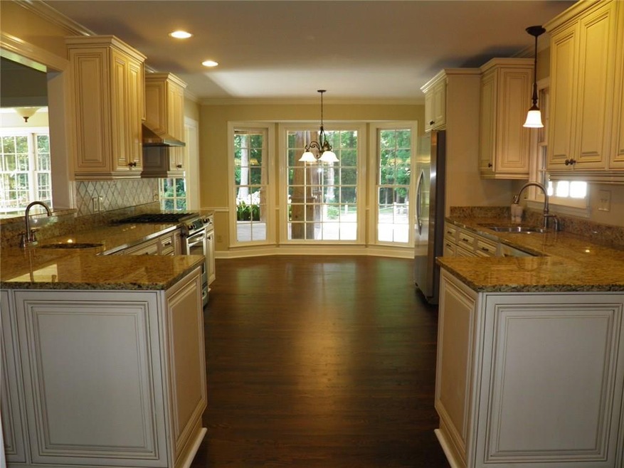 Fabulous eat in kitchen with large bay window to t