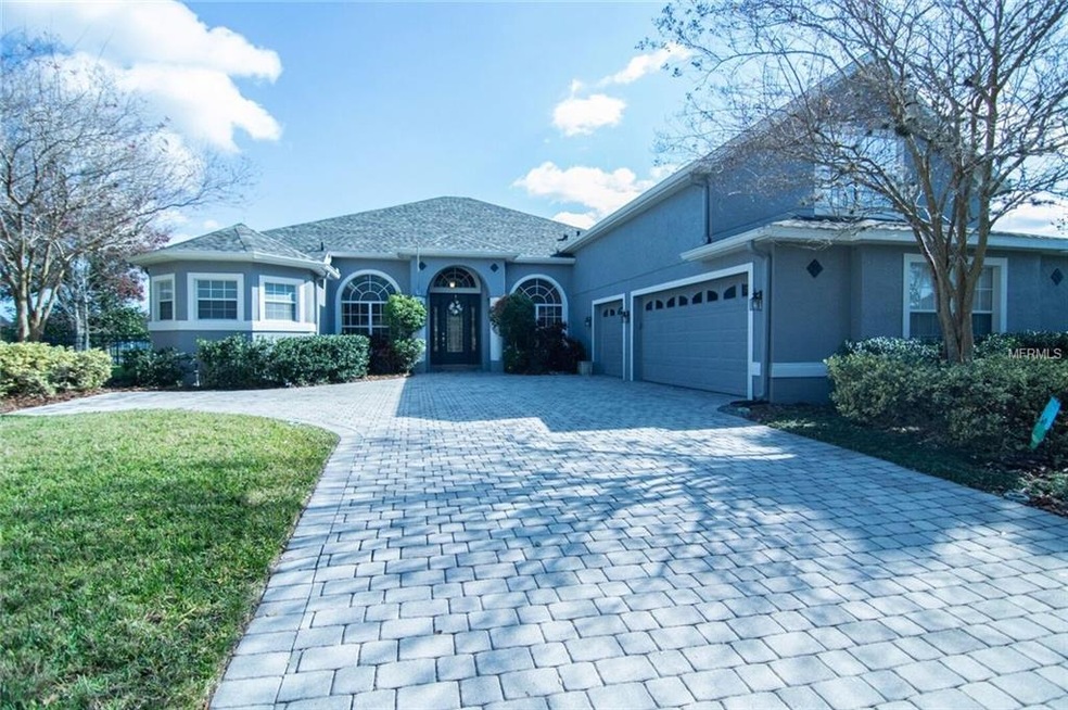 3 car garage with courtyard style driveway