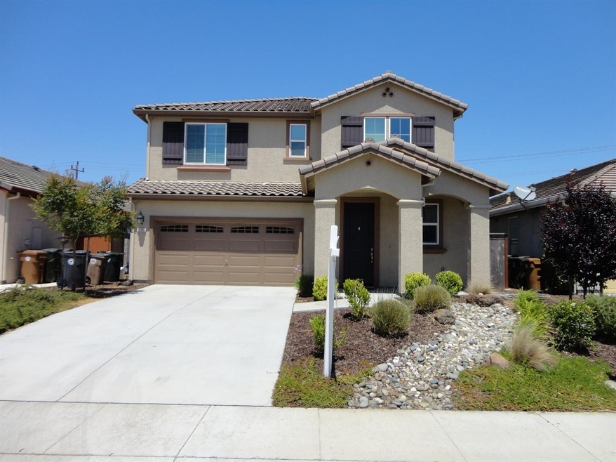 2 car garage and low maintenance landscape