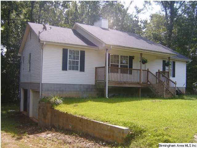 NESTLED ON 5 +/- ACRES