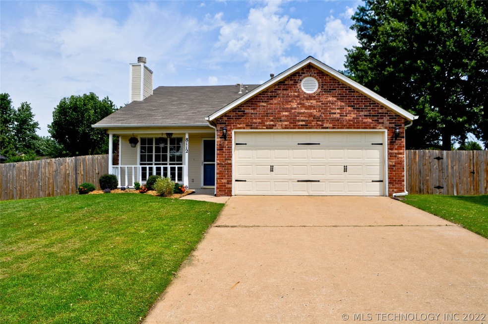 The established lawn and landscaping add appeal an