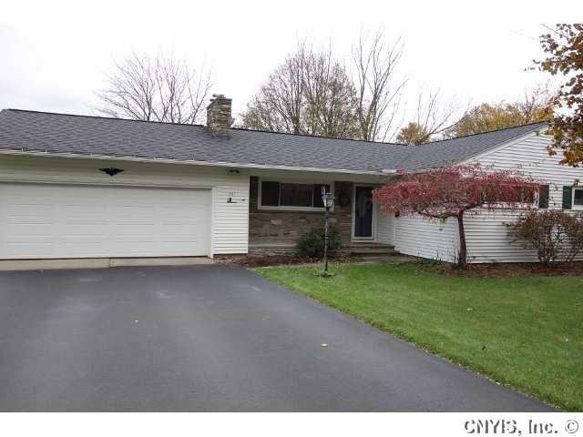 Exterior Front. 2 car garage with pedestrian door 