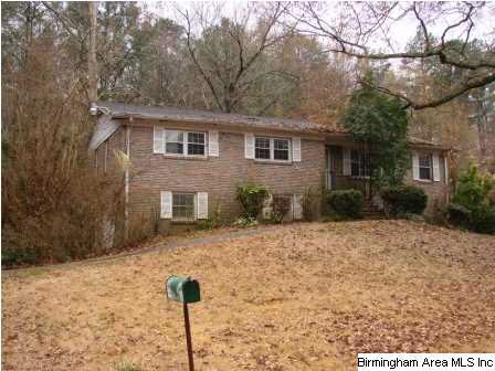 Front view of this 1 level all brick property with