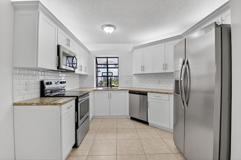 5140 Floria Way unit F, Boynton Beach, FL 33437 - photo 1