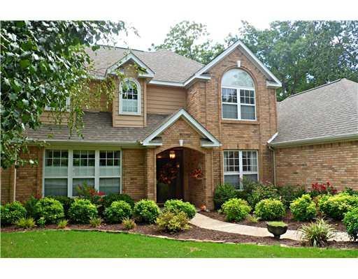Exterior Front. A beautiful traditional brick home with expecitional landscaping.