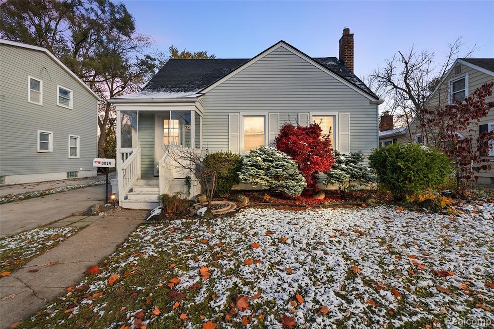 Bungalow featuring a chimney, a porch, and a shingled roof
