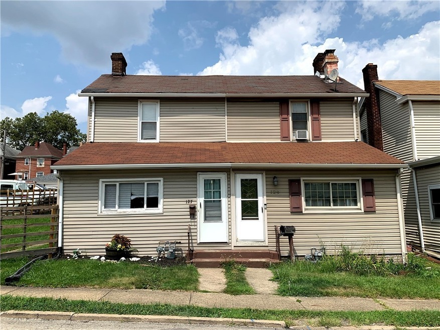 127-129 E 22nd Ave Side by Side Duplex