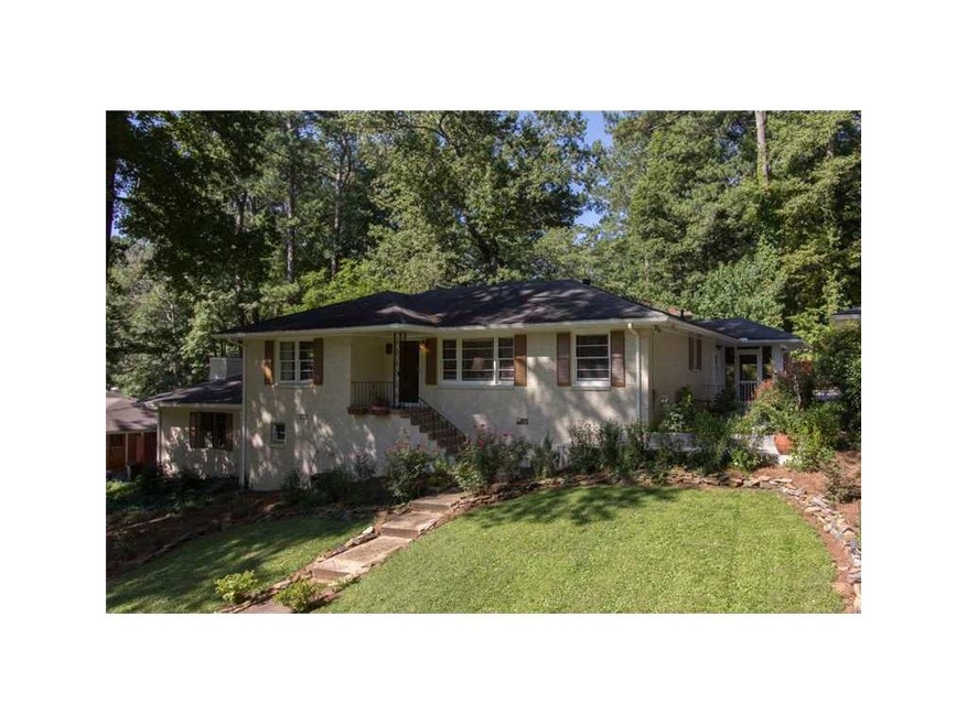 Exterior Front. Painted brick ranch