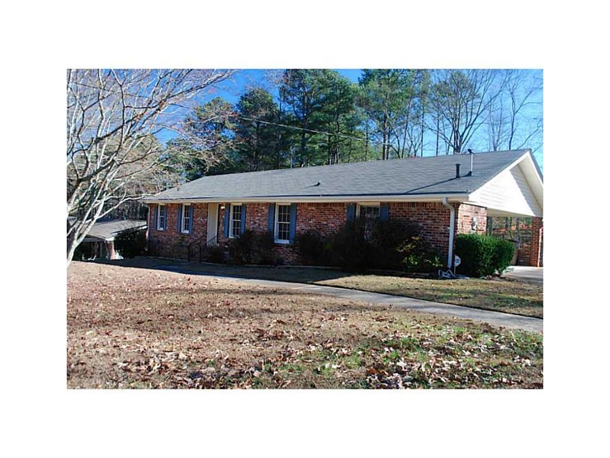 Exterior Front. Four sided brick ranch