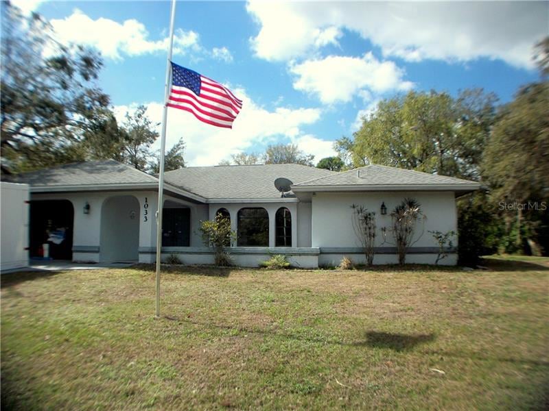 1033 Fleetwood Dr NW, Port Charlotte, FL 33948 - photo 1