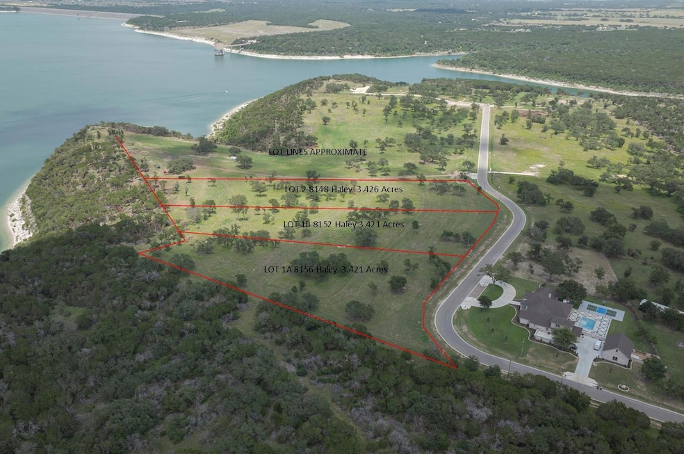 Aerial overview of property's location with a lar