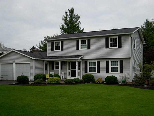 Exterior Front. Set on a large corner lot, this Co