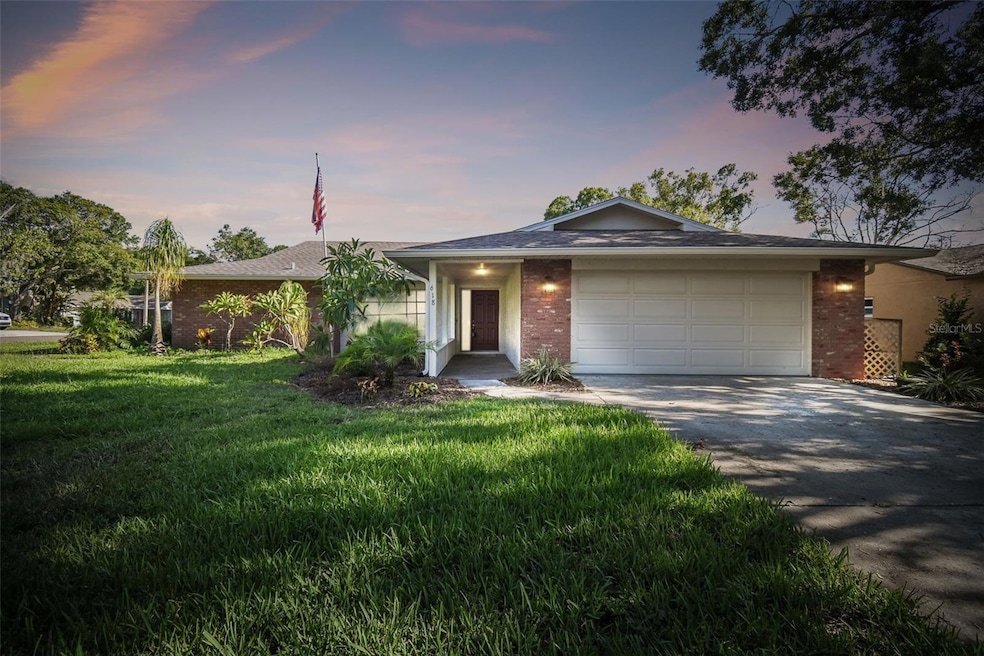 618 Sugar Mill Rd, Tarpon Springs, FL 34689 - photo 1