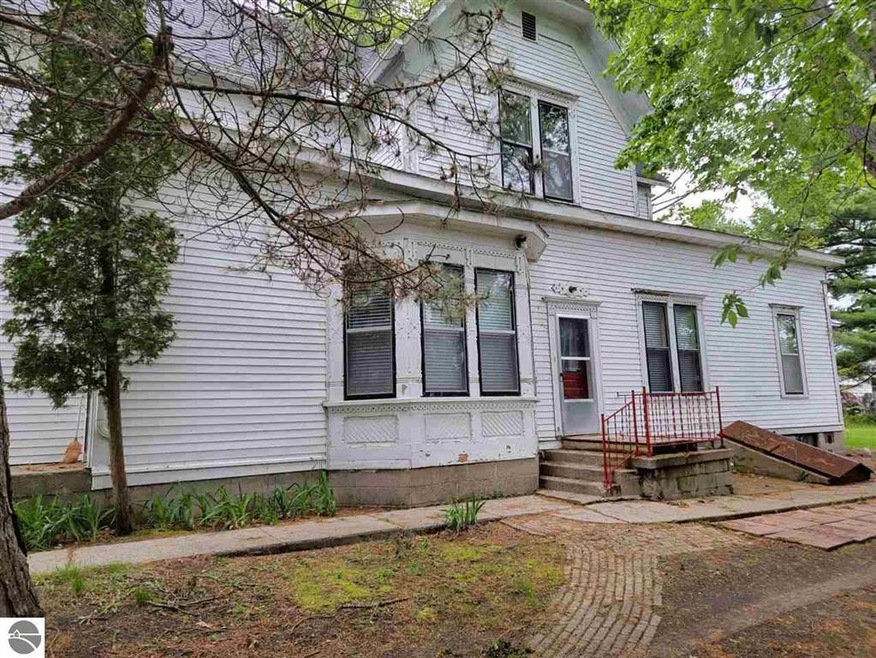 308 W Dwight St, Oscoda, MI 48750 - photo 1