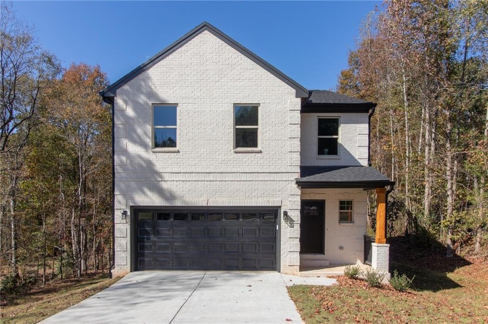 View of front property featuring a garage