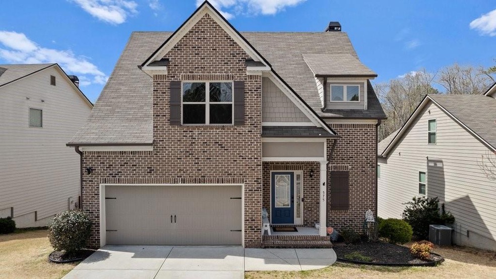 View of front of property featuring central AC and