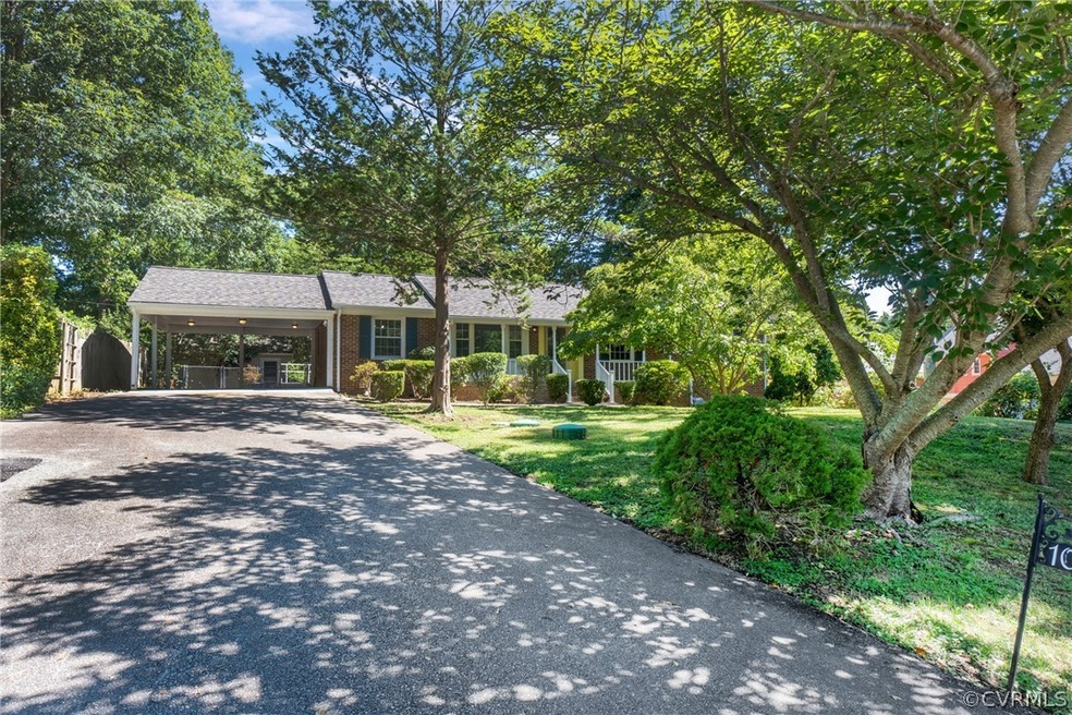 Ranch-style house with a carport