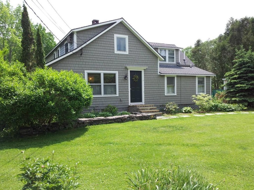Beautiful gardens surround this home!
