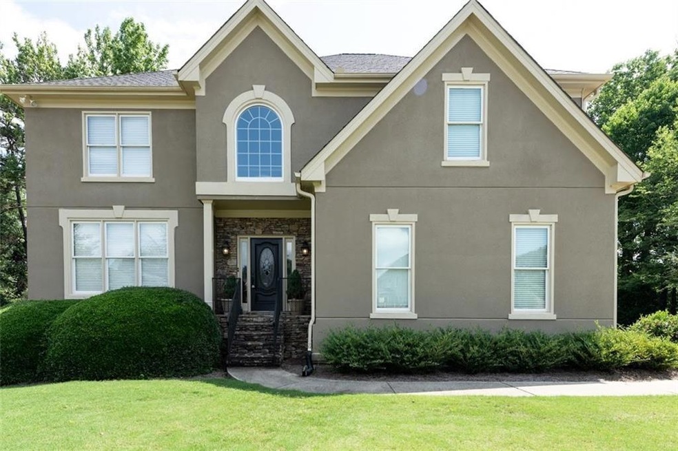 View of front of house with a front yard