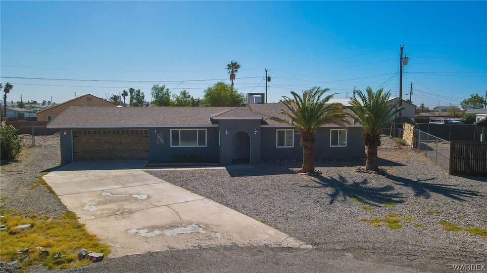 Single story home featuring a garage