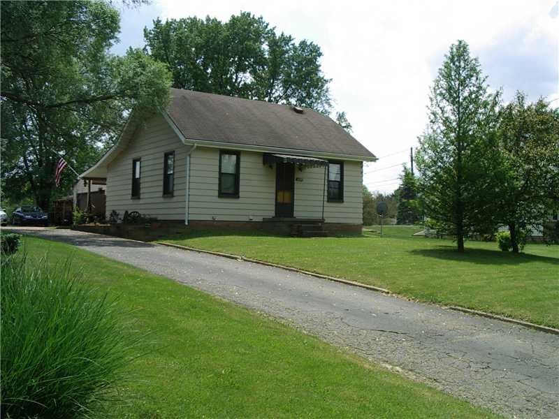 Exterior Front. Exceptional yard * 2 car garage an