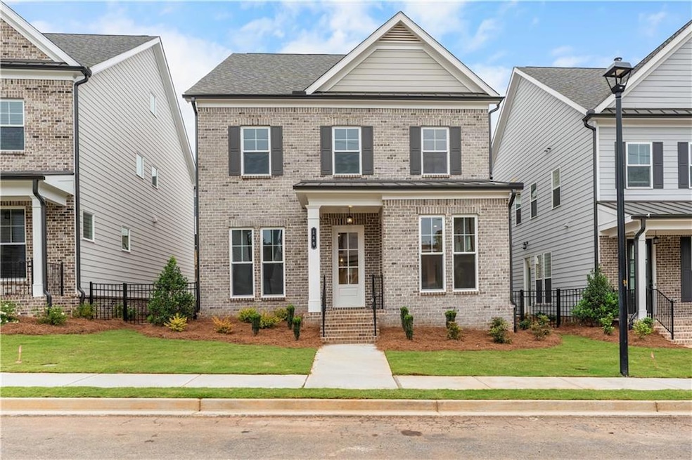 The beautiful brick exterior is an inviting front entry for you and guests! Last remaining 2 story plan with a bedroom on the main floor!