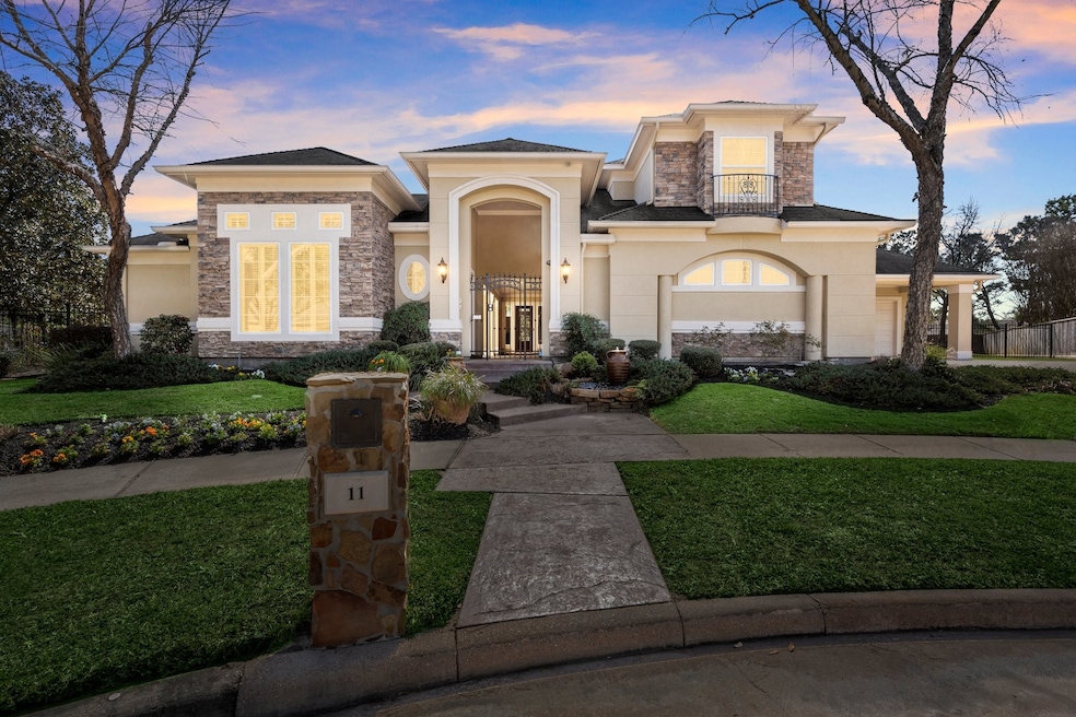Stunning evening view of this Bob Hale custom home