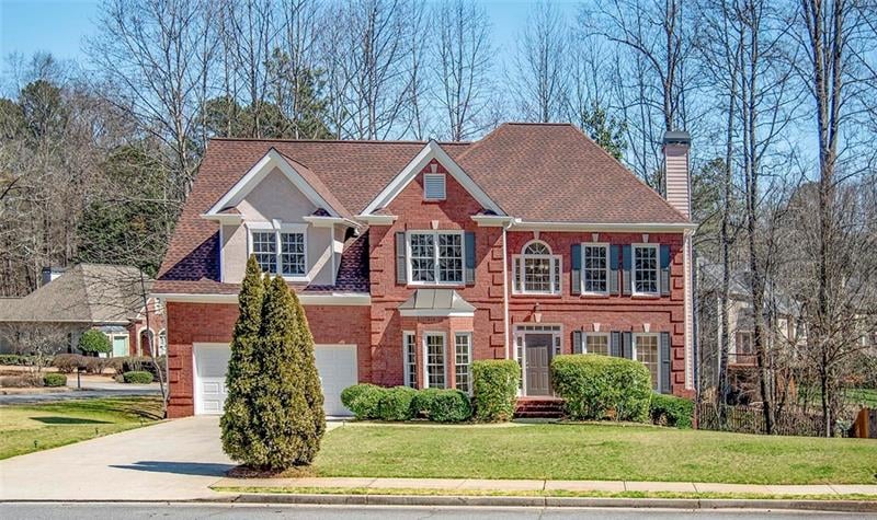 Brick front and brick apron on sides and back. Lar