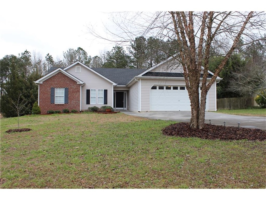 Front View of this Spacious Home on large level lo